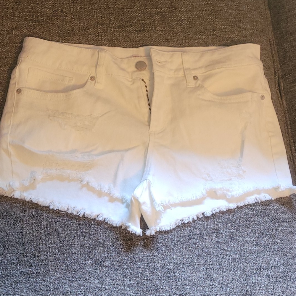 White distressed shorts